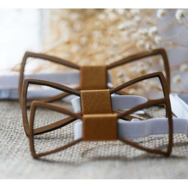 Mini papillon in legno con arasbeschi incavati 